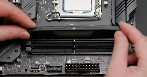 Installing the RAM module into the slot on the computer's motherboard. Asse.. Stock Footage 264152843