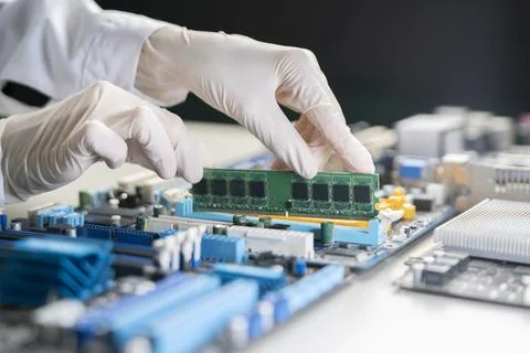 Installing the ram (random access memory into pc motherboard, hardware service c Stock Photos