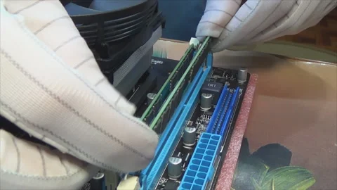 Installing a RAM strap into the motherboard of a personal computer Stock-Footage 144094541