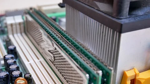 Installing random access memory RAM into motherboard Stock Footage 92104116