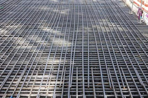 Installing reinforcement mesh in construction site Stock Photos