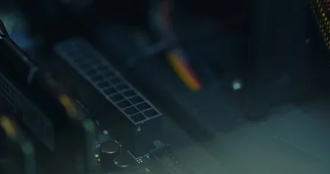 Installing the SATA connector ATX 24 pin on the motherboard Stock Footage 126039828
