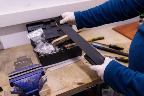 Installing Self Adhesive Cable Duct Cover Strip, Preparing Cable Management Chan Foto stock