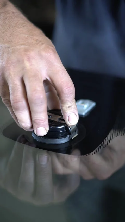 Installing a sensor on a car glass Stock Footage 314793875