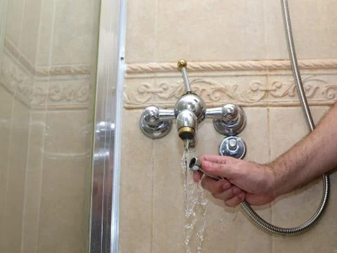 Installing a shower hose Stock Photos