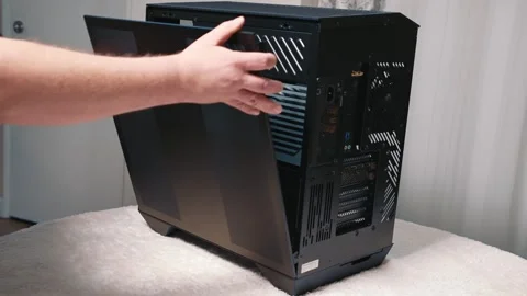 Installing side panel of computer case after desktop assembly Stock Footage 328980304