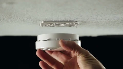 Installing a smoke detector Stock Footage 46040079