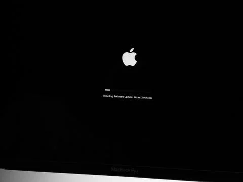 Installing Software update About three minutes left Stock Photos
