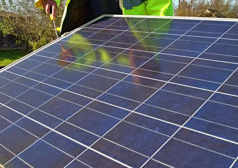 Installing solar panel Stock Photos