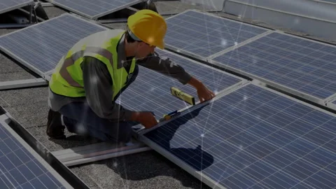 Installing solar panels, worker in safety gear over solar energy animation Видео 303538880