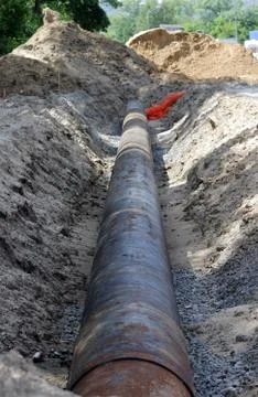 Installing storm drain system to reduce flooding during storms. Stock Photos