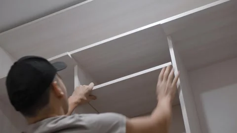 Installing Stylish Shelves Video stock 301565042