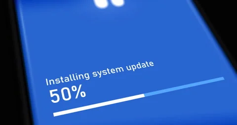 Installing system update on blue smartphone screen, software update process Stock Footage 280207028