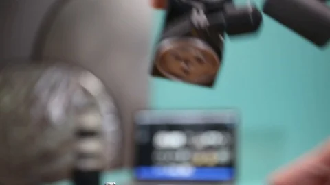 Installing three-way head to tripod. 스톡 동영상 127525301