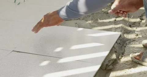 Installing tiles step-by-step guide home renovation tutorial indoor setting Video stock 333183326
