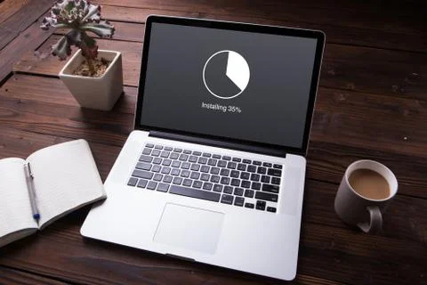 Installing update with circle load percentage waiting indicator concept Stock Photos