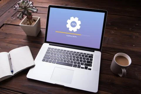 Installing update process with gearbox percentage progress and loading bar on  Stock Photos