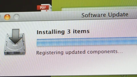 Installing updates on Apple iMac computer Stock Footage 99138392