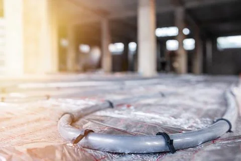 Installing Water Heating Underfloor Pipes: Enhancing Heating Systems with Stock Photos