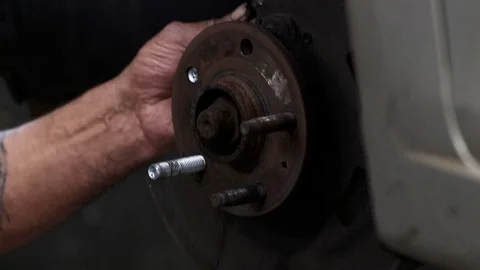 Installing wheel stud v2 Stock Footage 114932004