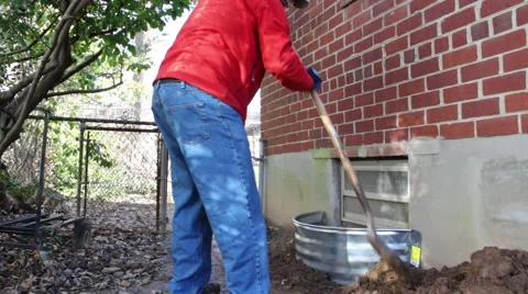 Installing a window well Stock Footage 45431832