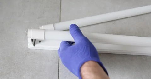 Installs an LED bulb Stock Footage 318021728