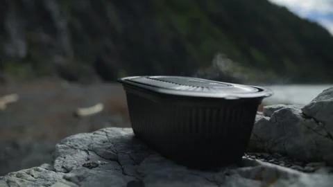 Instant Chinese rice in a container placed outdoors Stock Footage 296705924