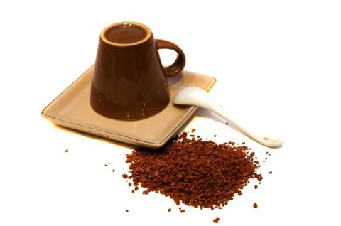 Instant coffee and inverted cup Stock Photos