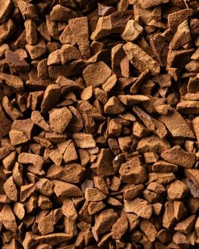 Instant coffee granules texture background macro Stock Photos
