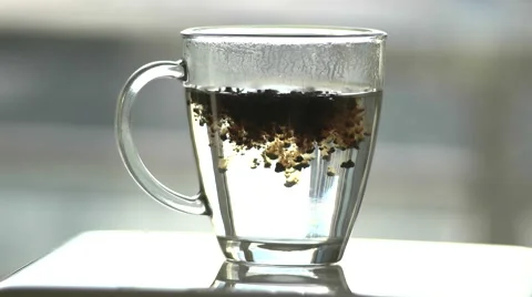 Instant Coffee Mixing in Slow Motion Stock Footage 57243246