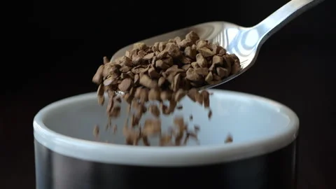 Instant Coffee Pieces Falling From Spoon in Slow Motion in Cup. Fresh Morni.. Stock Footage 321423664