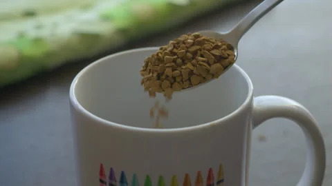 Instant Coffee Pieces Falling From Spoon in Slow Motion in Cup. Fresh Morni.. Stock-Footage 326004759