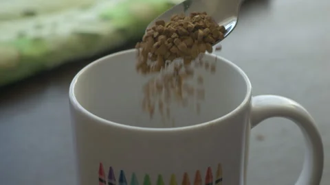 Instant Coffee Pieces Falling From Spoon in Slow Motion in Cup. Fresh Morni.. Stock Footage 345744850