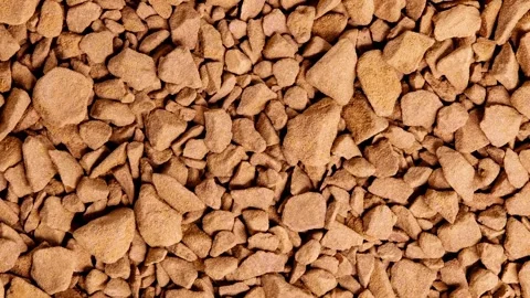 Instant coffee, small granules, bunch in bulk rotating, turning Video stock 240645225