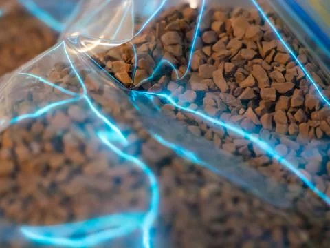 Instant coffee in a transparent package Stock Photos