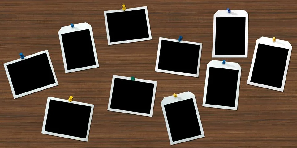 Instant frames hang on wall with colored pins Stock Photos