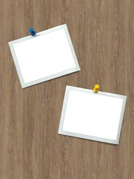 Instant frames hang on wall with colored pins Stock Photos