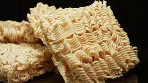 Instant noodle macro shot close up rotation. Ramen noodle for quick soup. F.. Video stock 271095421