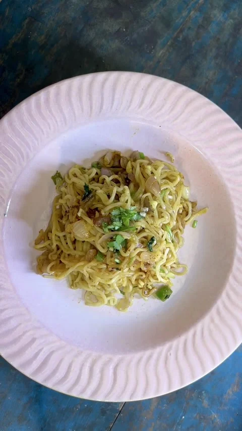 Instant noodles with fork, served with vegetables and herbs, spicy asian lunch Stock Footage 287306596