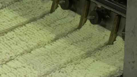 Instant noodles move along the conveyor ... | Stock Video | Pond5