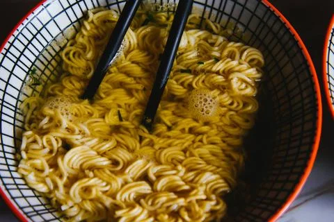 Instant pasta, Japanese and Chinese noodles. Ramen type soup in a plate wit.. Stock Photos