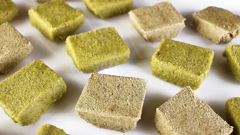 Instant soup cube stock beef vegetable cubes bouillon chcicken Video stock 97239745