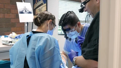 Instructing dentist students at the clinic Stock Footage 127000948