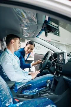 Instructing on test driving Stock Photos