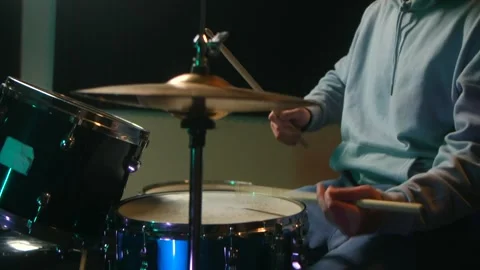 Instructional process, skilled drummer demonstrates proper hand positioning and Stock Footage 312846815