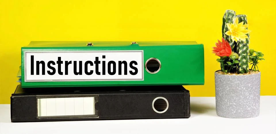 Instructions. A text label on the document folder. Stock Photos