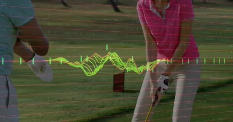 Instructor and student practicing putting on green, showing digital finance Stock Footage 328408783