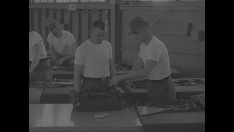 Instructor checking soldiers parachute bag - 1967 Stock Footage 118316176
