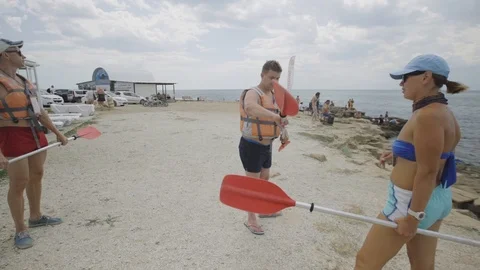 The instructor conducts training in rowing Stock Footage 94346307