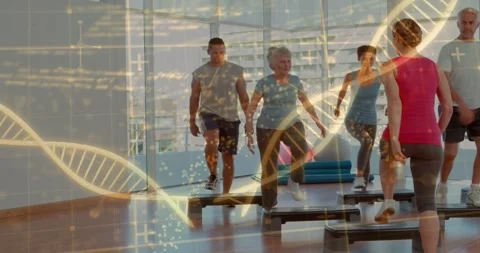Instructor cueing step class in studio, group stepping on steps with DNA helix Stock Footage 331272977